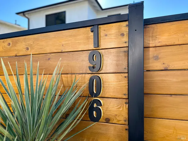 a view of kitchen with furniture and wooden floor