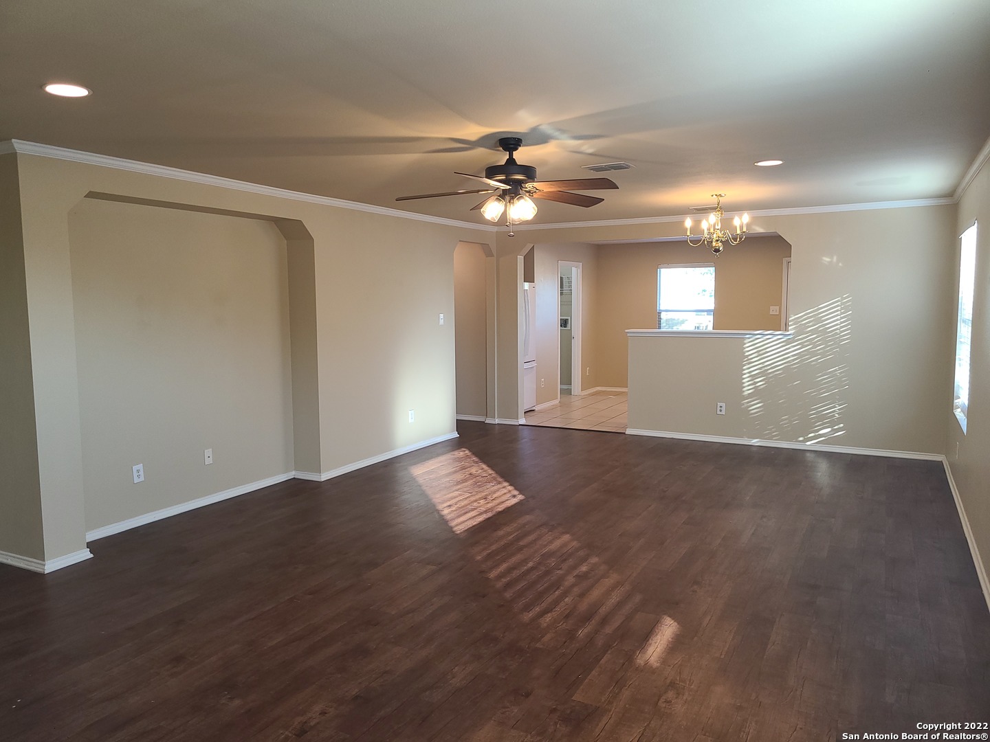 112 Willow Run Cibolo, TX 78108 - Photo 3 of 21 a view of a livingroom with a ceiling fan window and hardwood floor