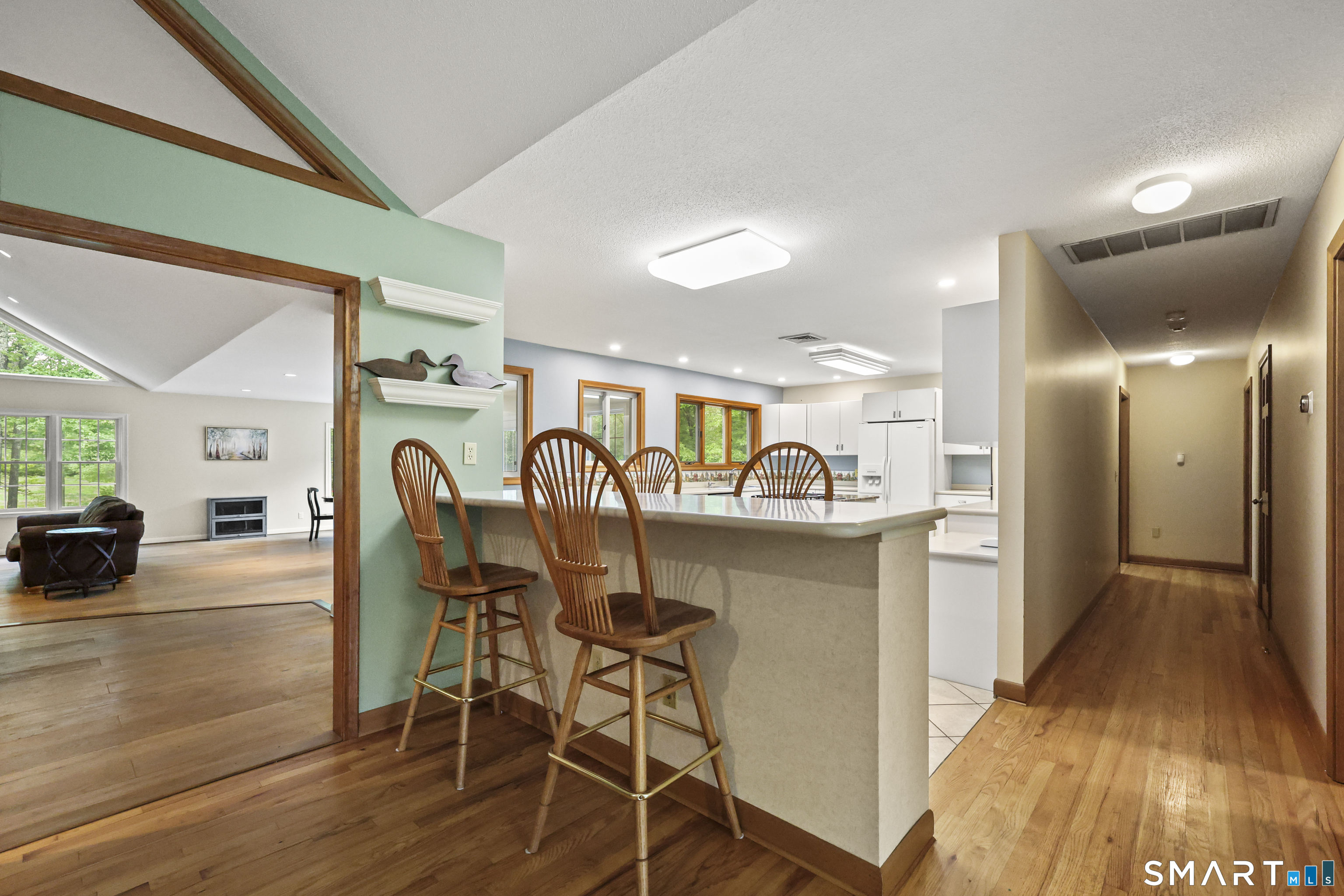 96 Spak Road Willington, CT 06279 - Photo 10 of 40 Open concept kitchen is ideally prepped for comfortable everyday living & entertaining with large breakfast bar.