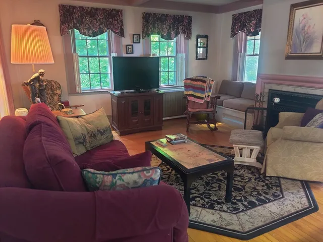 a living room with furniture and window