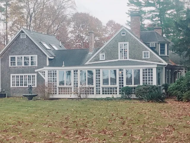 a view of backyard with green space