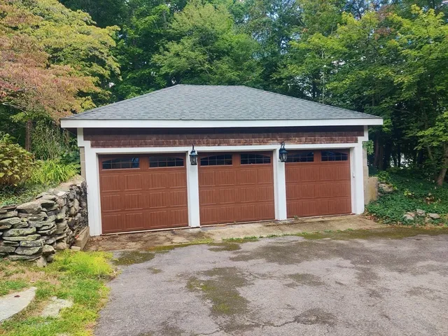 front view of a house with a small yard