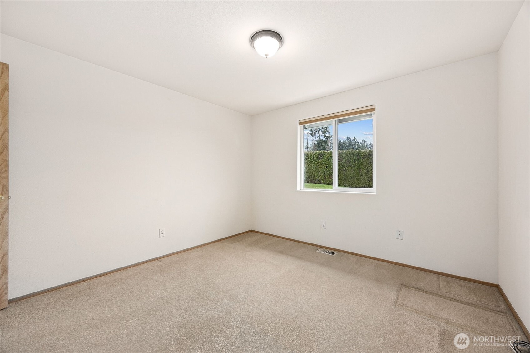 12601 227th Street East Graham, WA 98338 - Photo 14 of 27 an empty room with a window