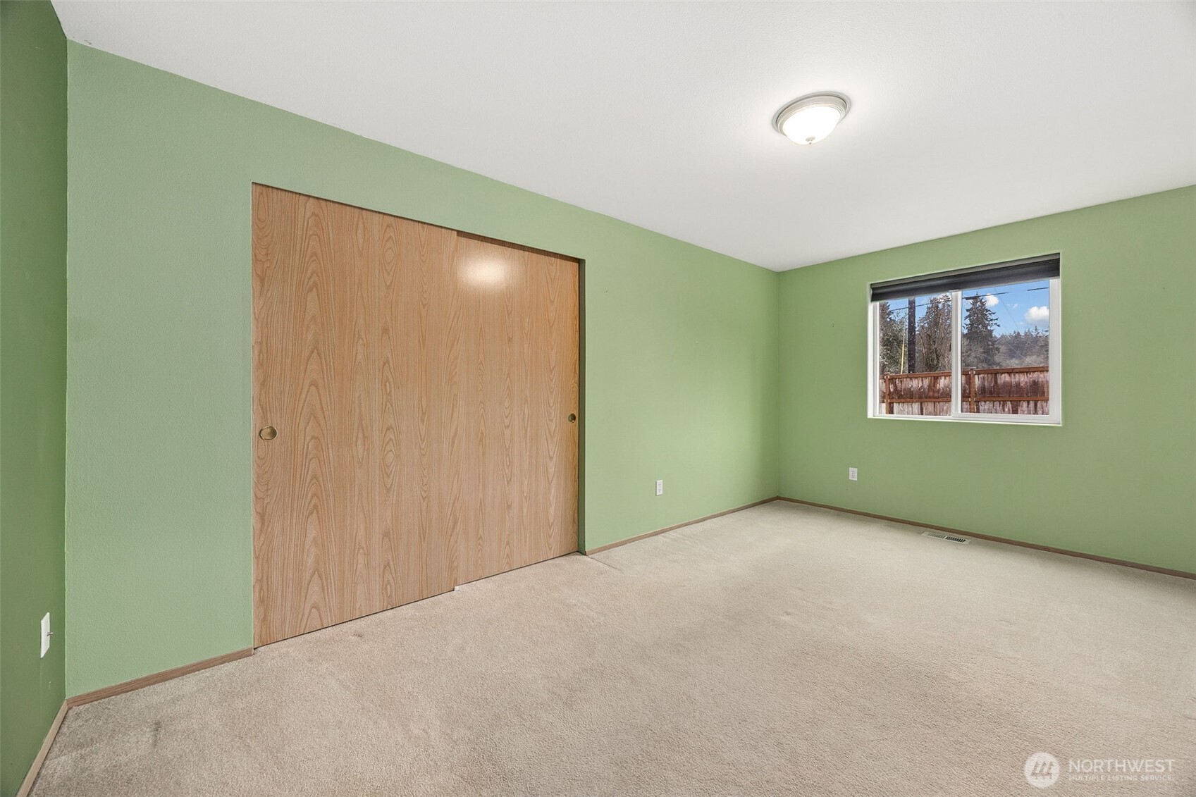 12601 227th Street East Graham, WA 98338 - Photo 16 of 27 a view of an empty room with a window