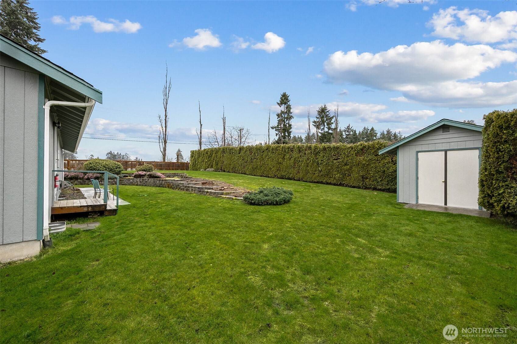 12601 227th Street East Graham, WA 98338 - Photo 26 of 27 a view of a garden with a slide