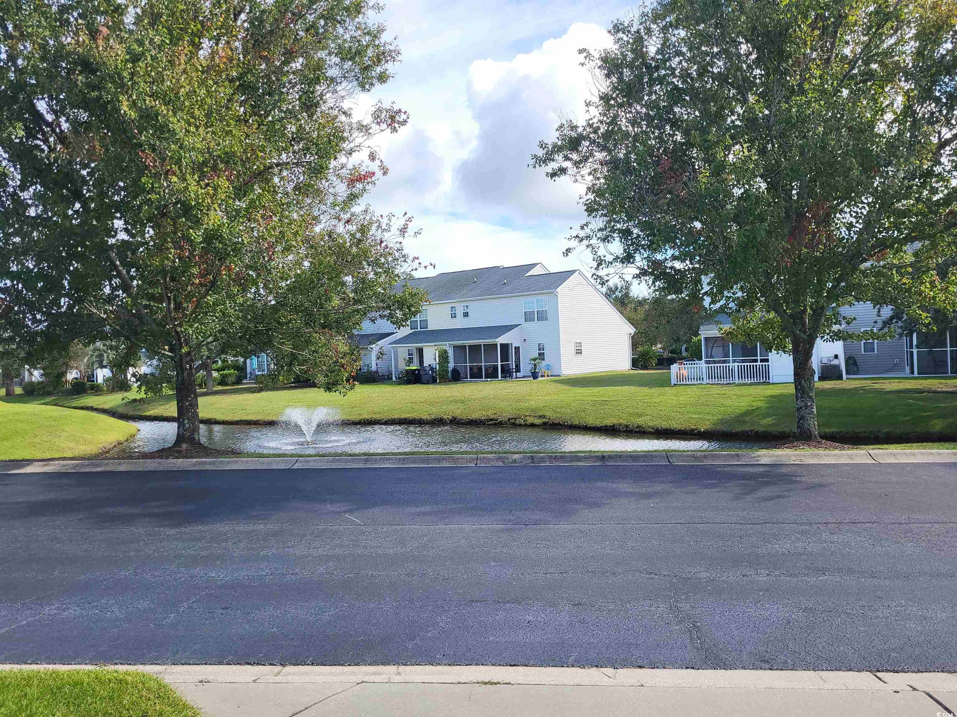 952 Williston Loop, Unit 952 Murrells Inlet, SC 29576 - Photo 3 of 30 View of front facade featuring a water view and a