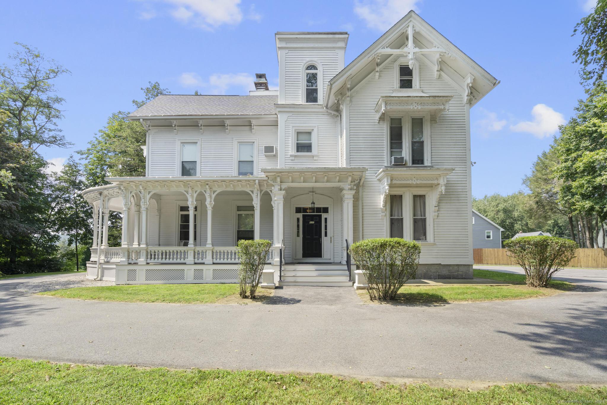 231 North Main Street, Unit 1 Ansonia, CT 06401 - Photo 1 of 1 a front view of a house with garden