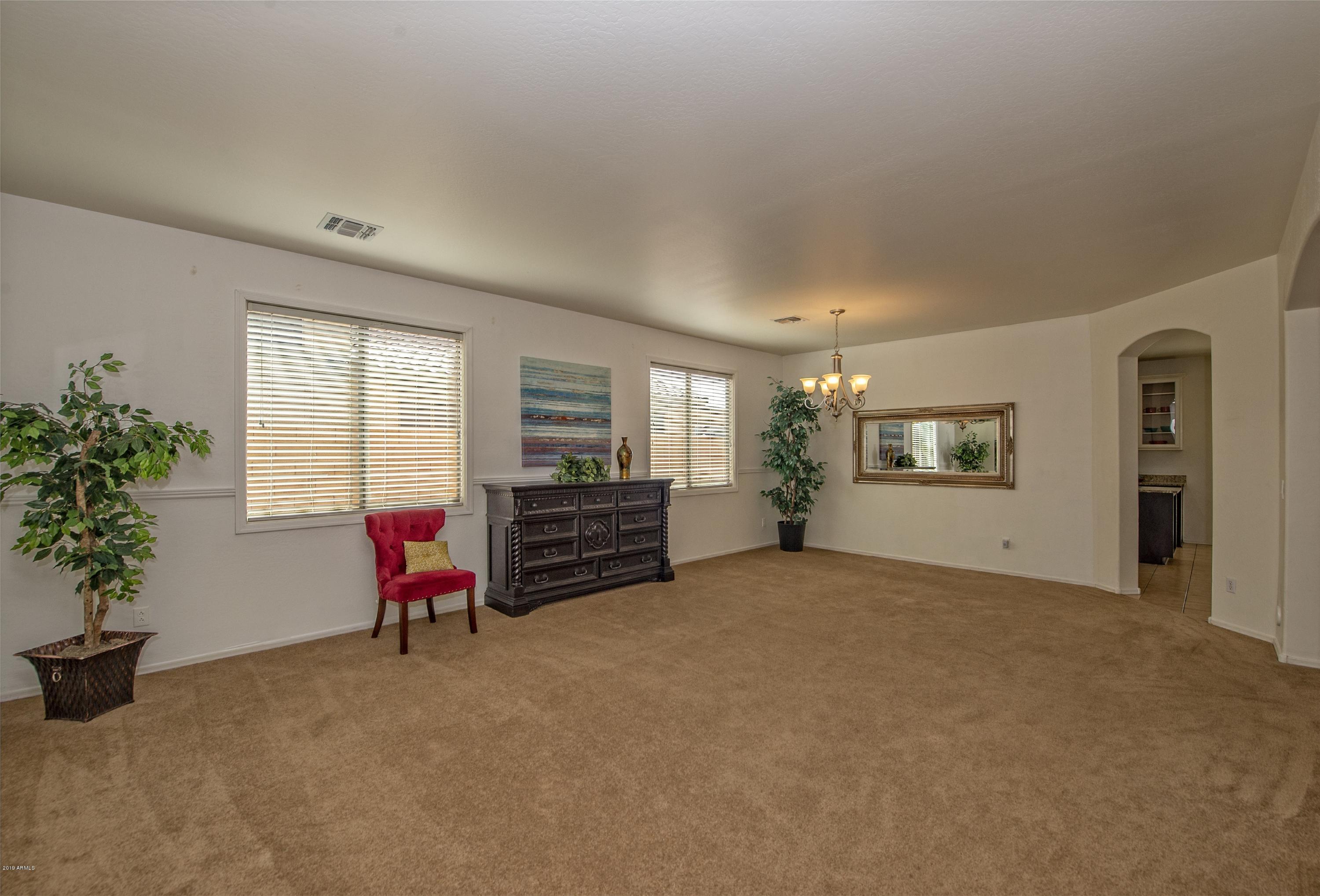 6807 West Carter Road Laveen, AZ 85339 - Photo 6 of 32 a view of livingroom with furniture and windows
