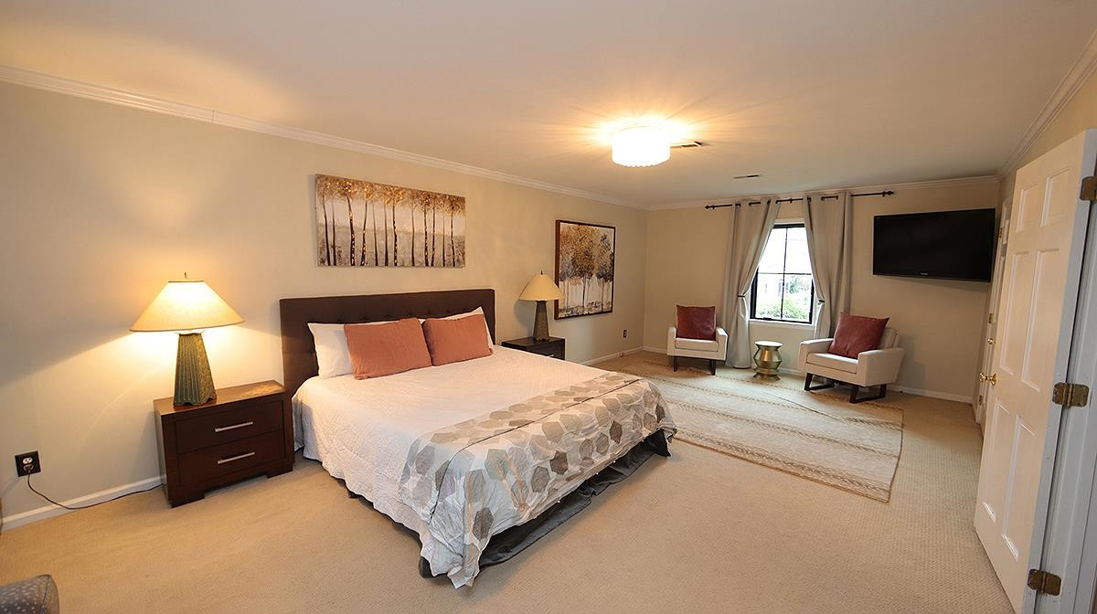 809 Young Street Raleigh, NC 27608 - Photo 20 of 35 Very grand size bedroom with plenty of closet space and a sitting area for privacy Owners suite