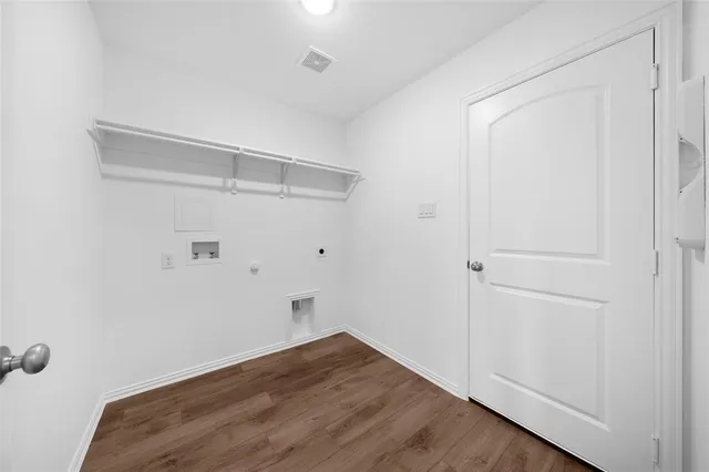 a view of small space with wooden floor