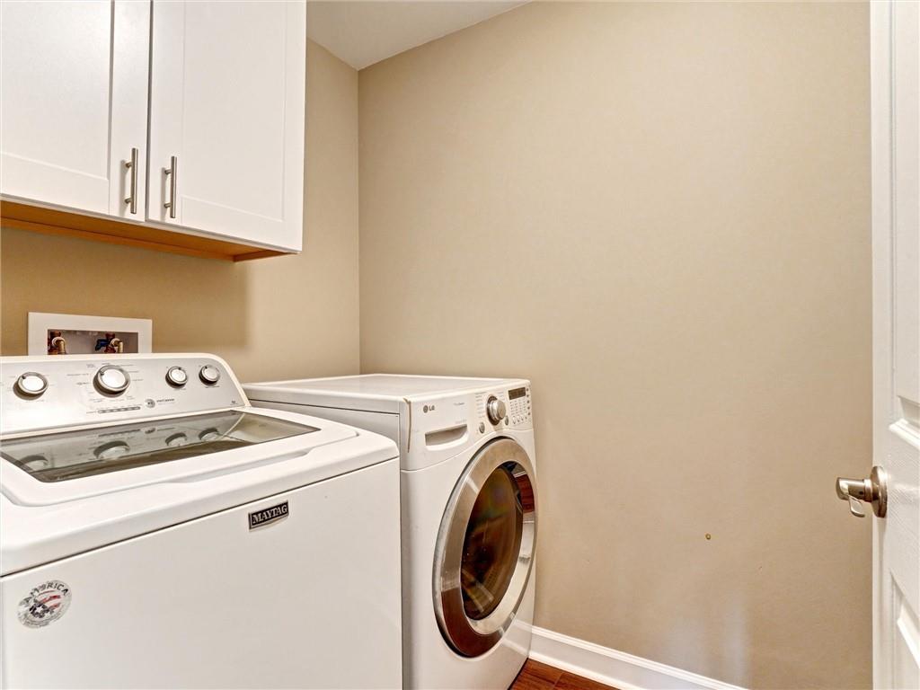3435 Kingsboro Road Northeast, Unit 1601 Atlanta, GA 30326 - Photo 30 of 54 a utility room with dryer and washer