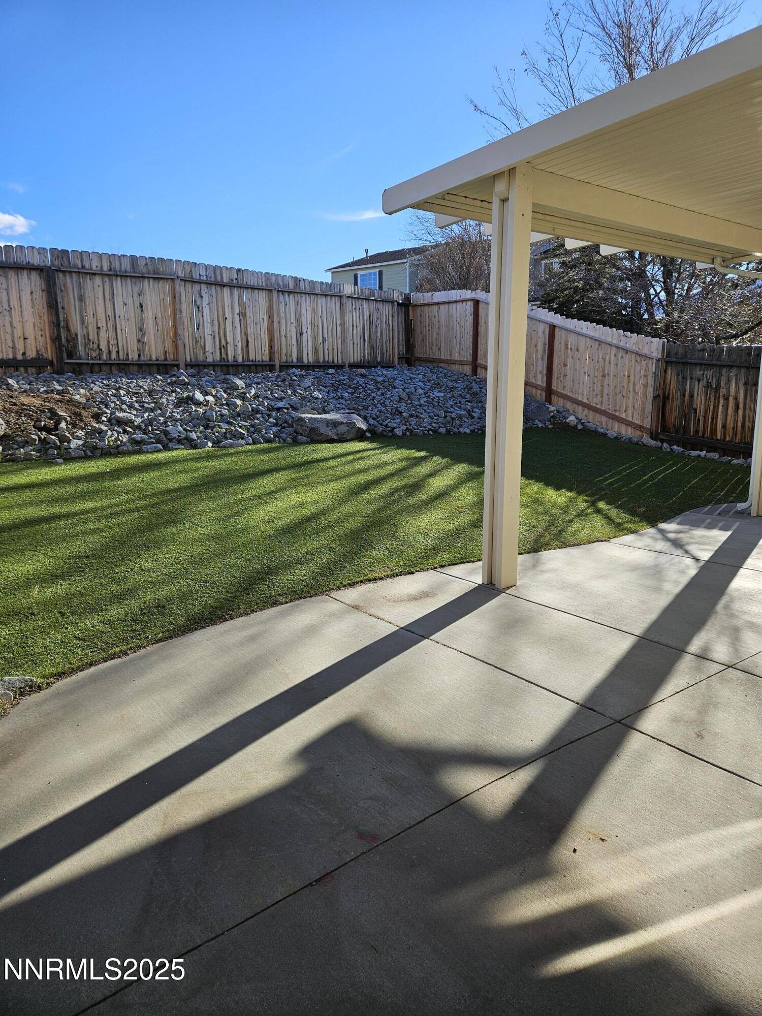 8944 Red Baron Boulevard Reno, NV 89506 - Photo 17 of 17 a view of a backyard with wooden fence