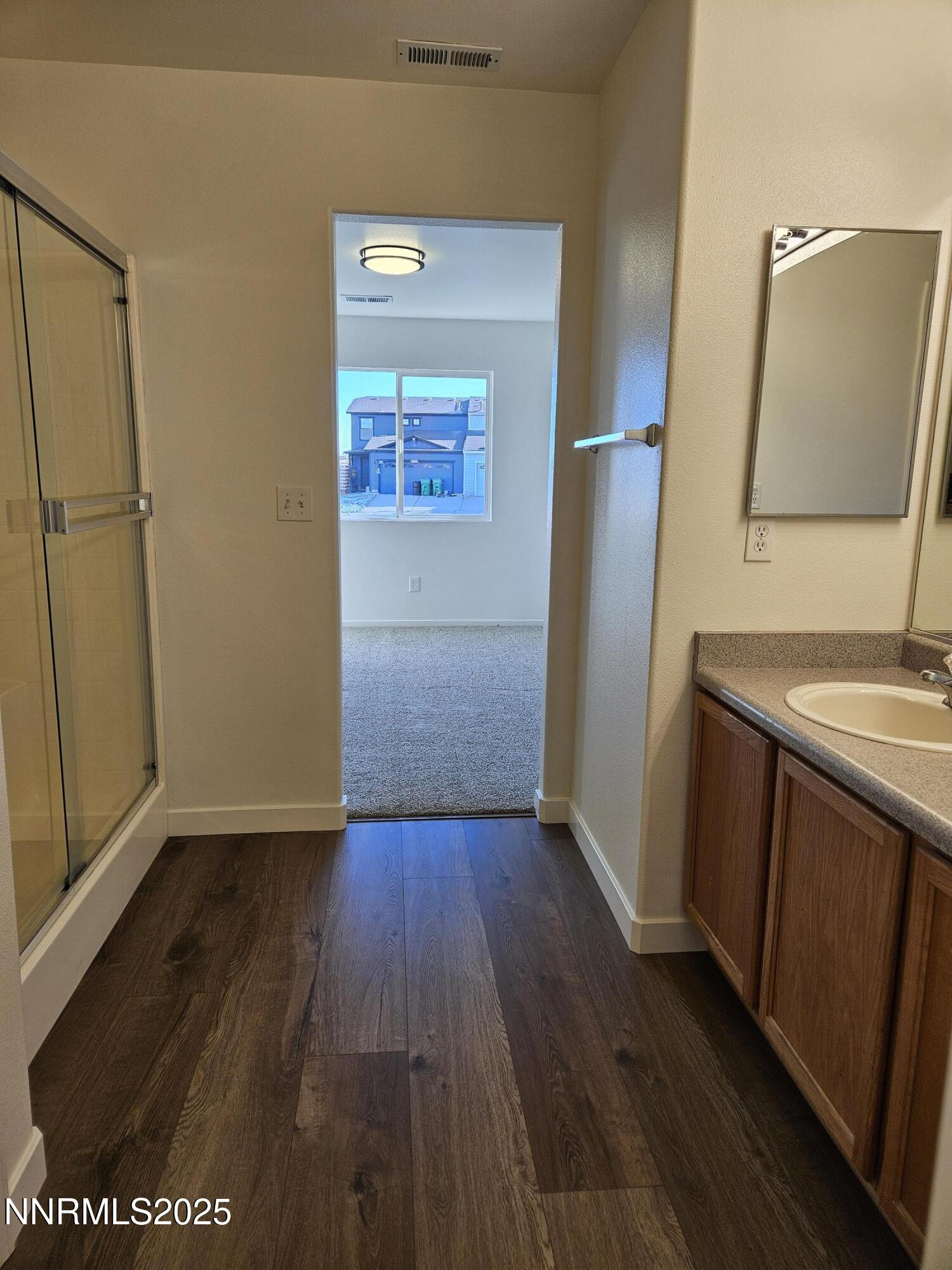 8944 Red Baron Boulevard Reno, NV 89506 - Photo 6 of 17 a view of hallway with wooden floor