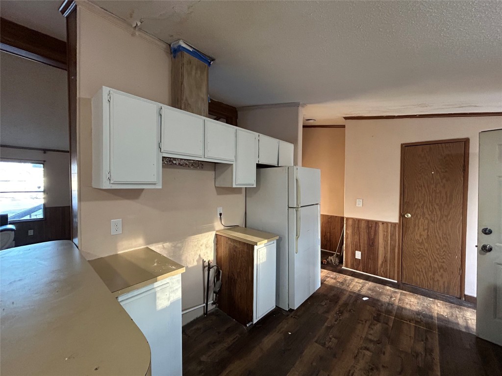 310 E Road Granbury, TX 76049 - Photo 15 of 22 a kitchen with stainless steel appliances a refrigerator and a stove top oven