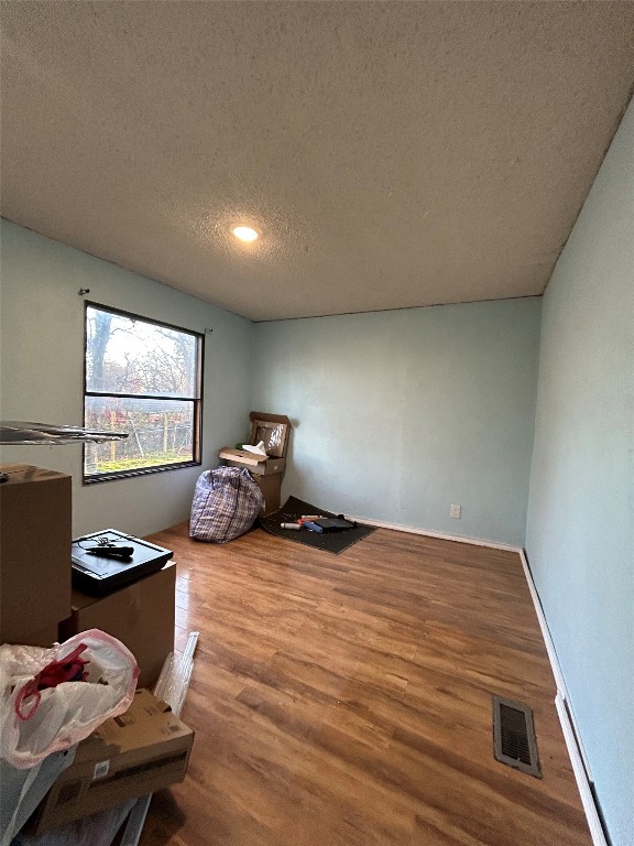 310 E Road Granbury, TX 76049 - Photo 19 of 22 a bed room with a bed and a window