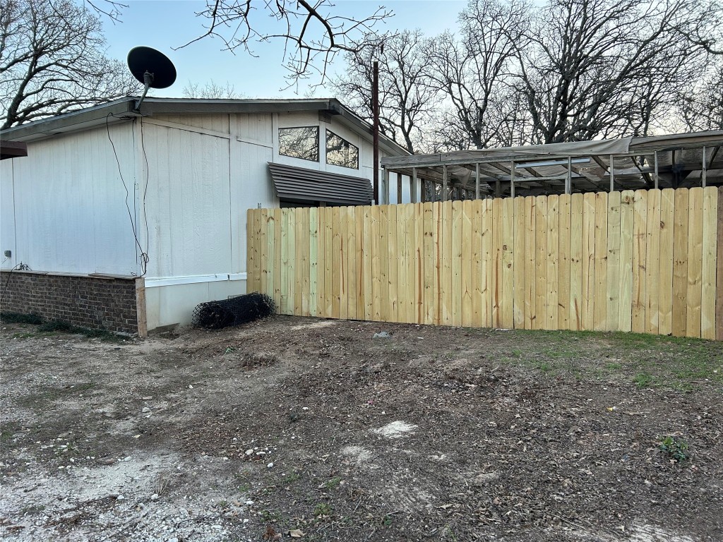 310 E Road Granbury, TX 76049 - Photo 20 of 22 a view of a backyard