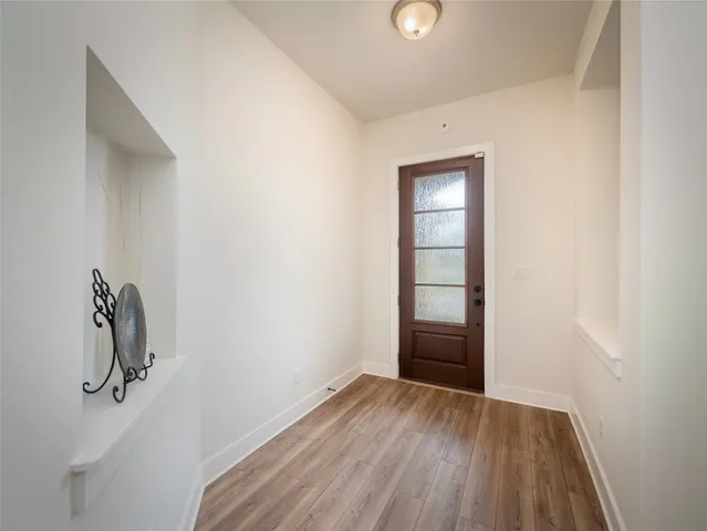 a view of empty room with windows