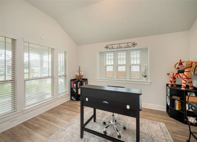 a room with furniture and window