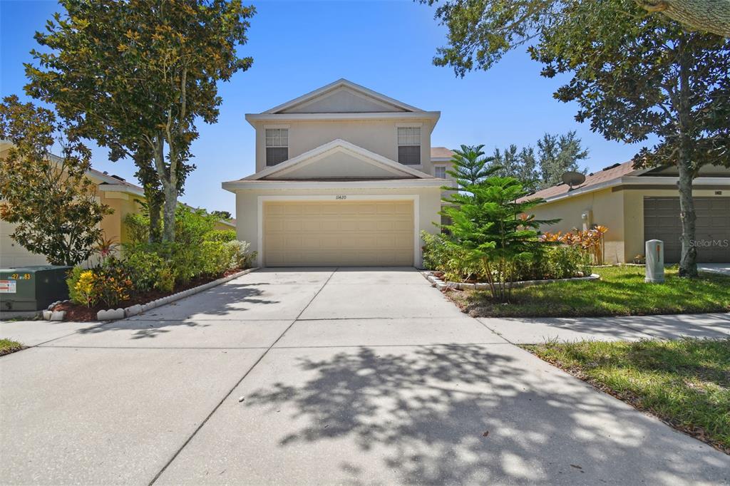 11420 Bay Gardens Loop Riverview, FL 33569 - Photo 1 of 1 a front view of a house with yard