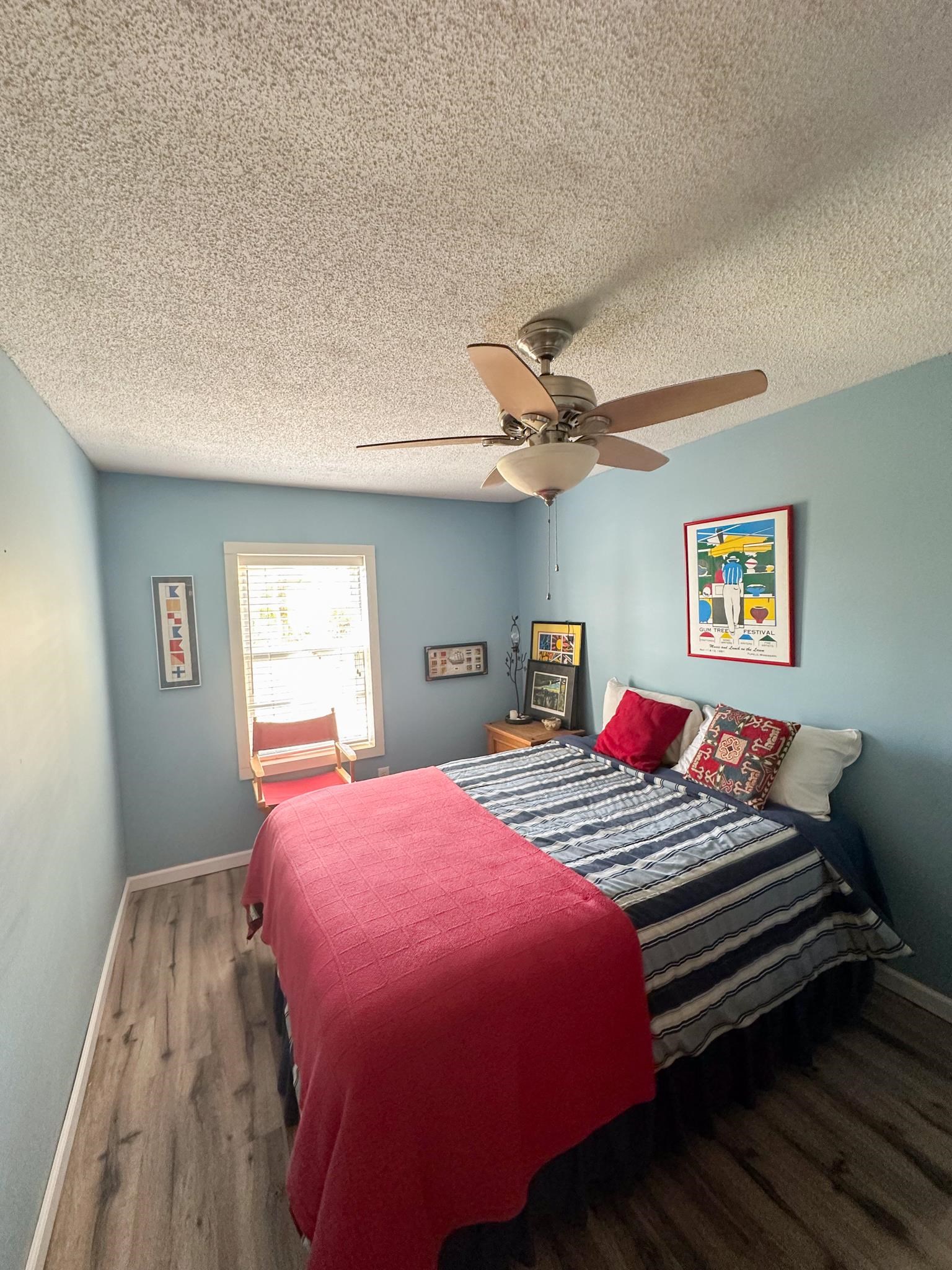 Lot 72 Cr 451 Road Iuka, MS 38852 - Photo 8 of 9 a bedroom with a bed and a chandelier