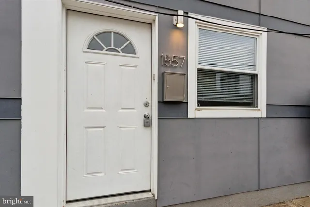 a bathroom with a toilet and shower