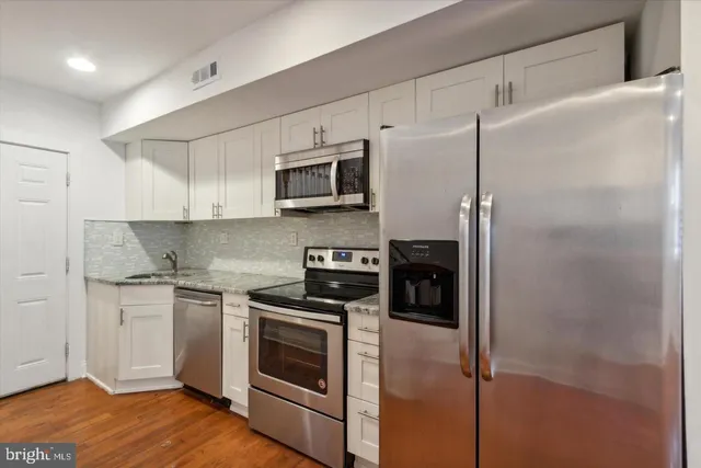a view of a house with a door and a window