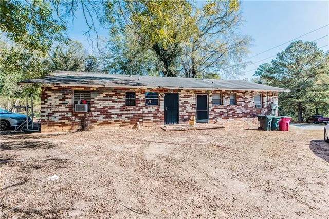 a view of street with large trees