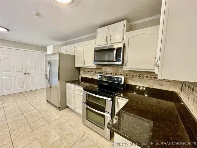 a bathroom with a shower and a toilet