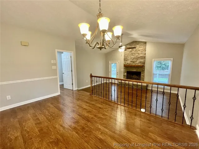 a kitchen with stainless steel appliances granite countertop a refrigerator a sink and dishwasher