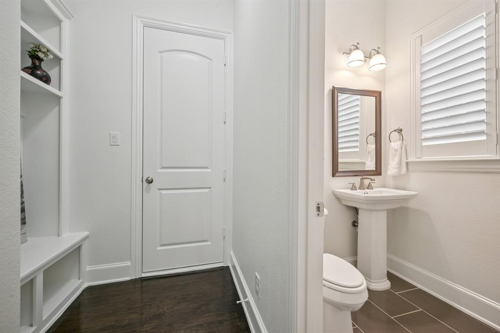 2029 Temperate Drive Allen, TX 75013 - Photo 20 of 40 a bathroom with a sink toilet and a mirror