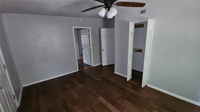 a kitchen with sink a refrigerator and a stove