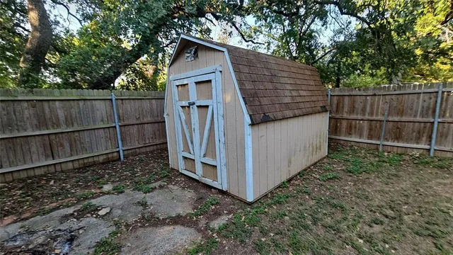 a view of a wooden fence