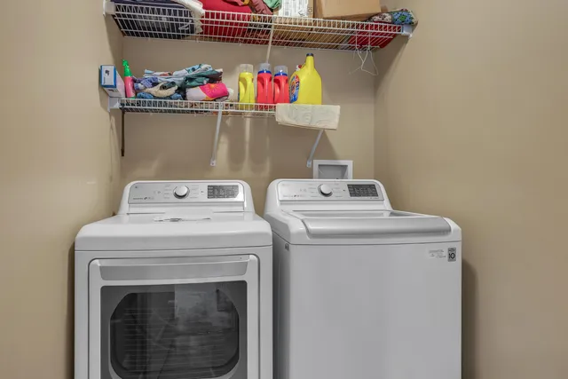 a view of a golf course with a lake view