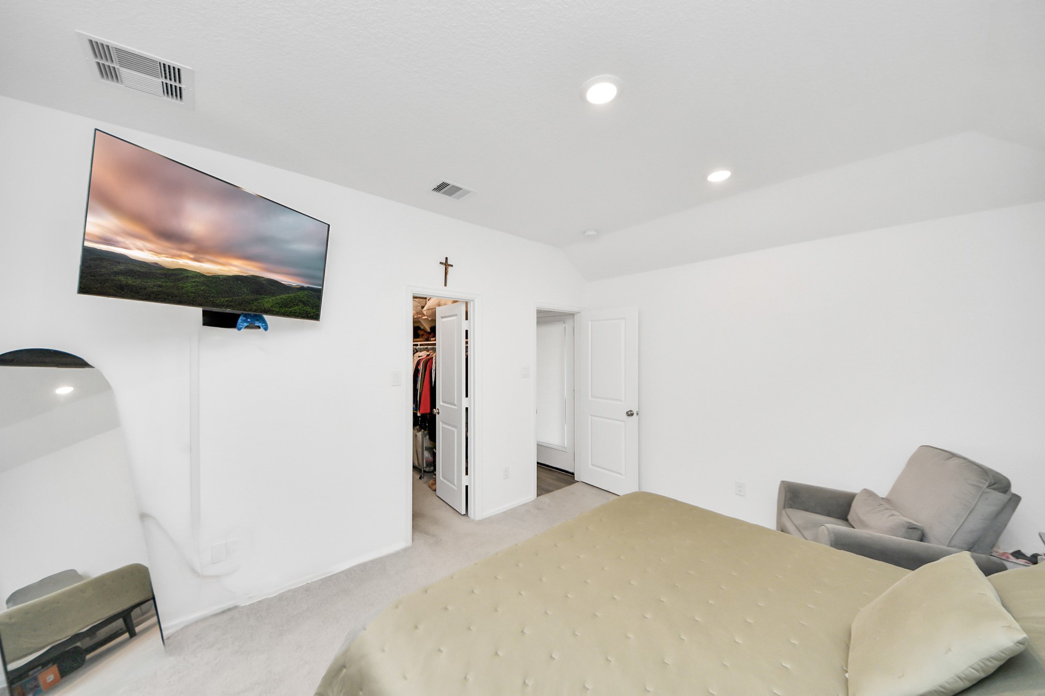 5418 Rabbit Crk Lane Richmond, TX 77469 - Photo 17 of 36 a bedroom with a bed and a flat screen tv