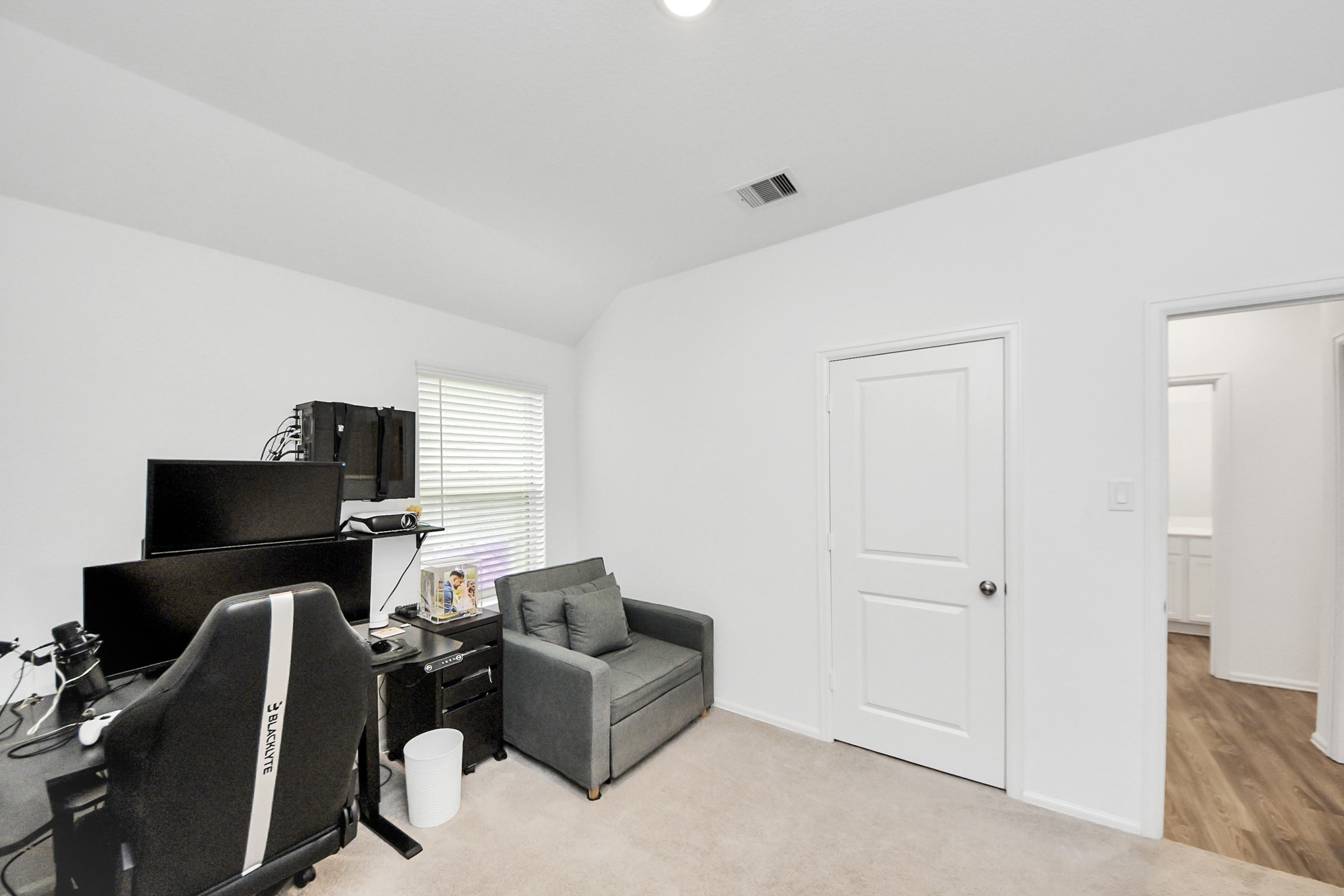 5418 Rabbit Crk Lane Richmond, TX 77469 - Photo 30 of 36 a livingroom with workspace and a couch