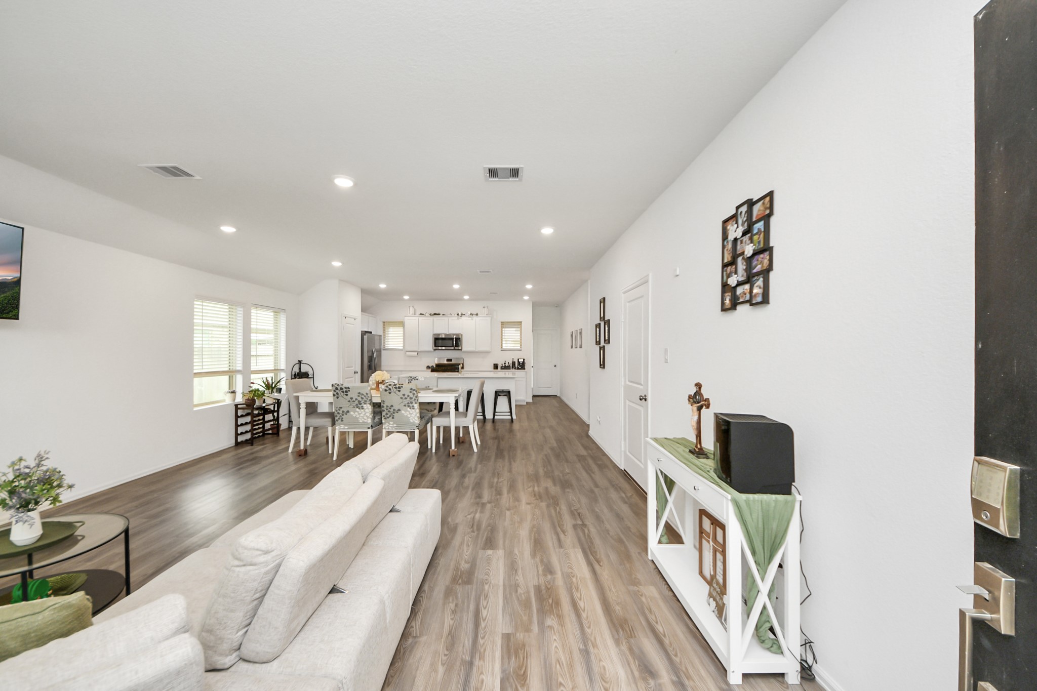 5418 Rabbit Crk Lane Richmond, TX 77469 - Photo 3 of 36 a living room with furniture and a wooden floor
