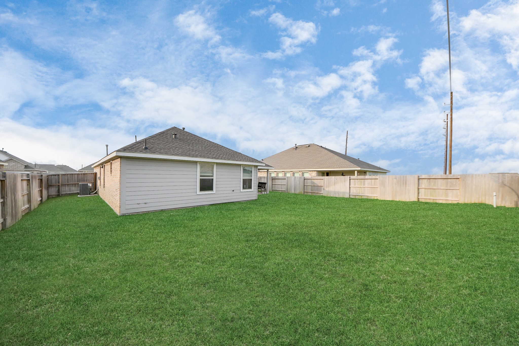 5418 Rabbit Crk Lane Richmond, TX 77469 - Photo 32 of 36 a view of a house with a yard