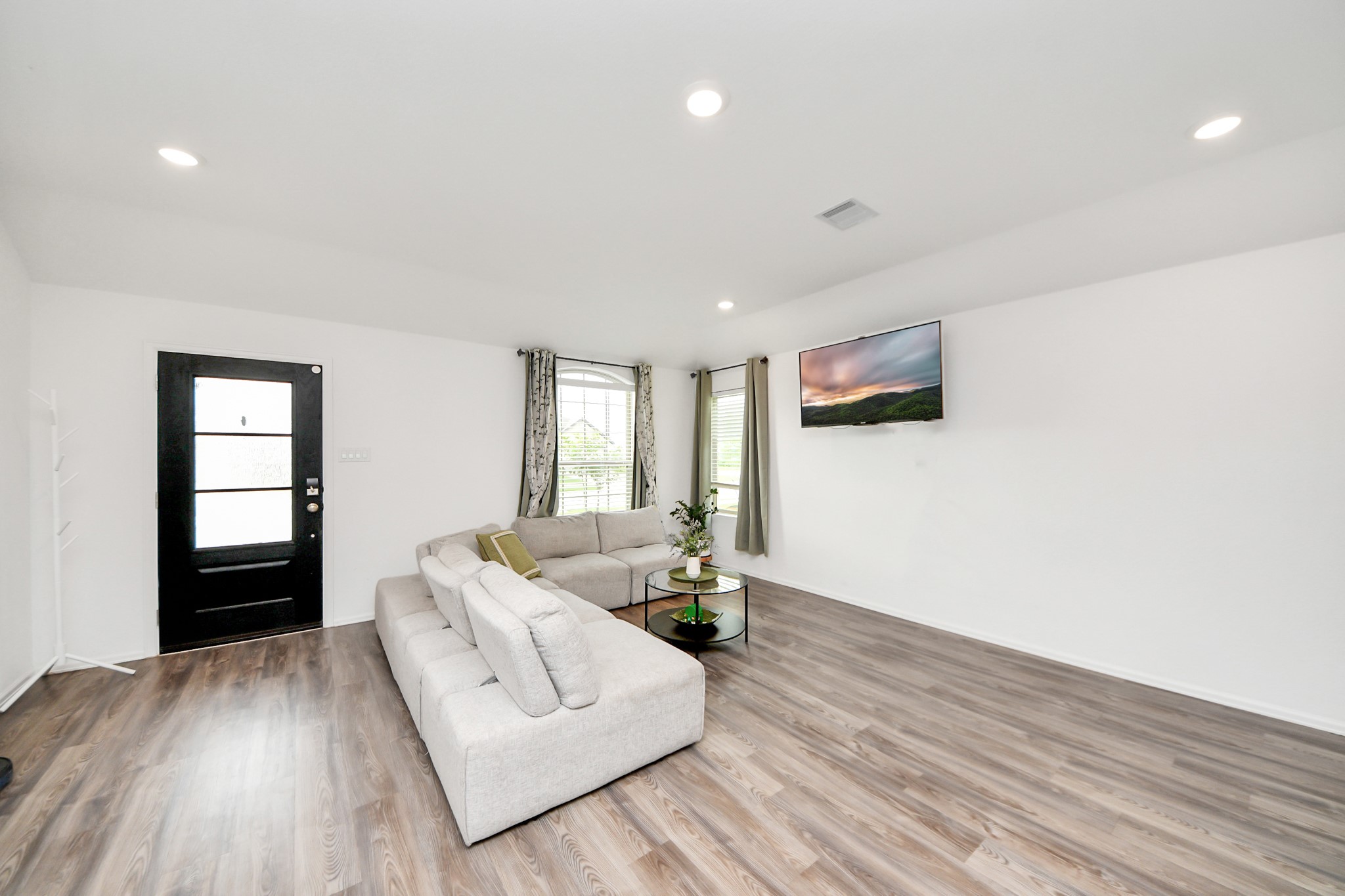 5418 Rabbit Crk Lane Richmond, TX 77469 - Photo 5 of 36 a living room with furniture and wooden floor