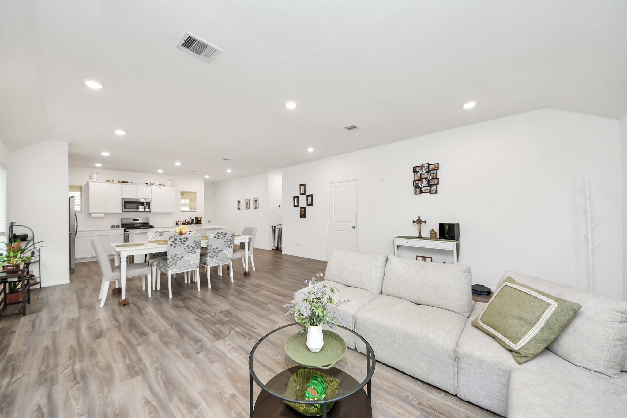 5418 Rabbit Crk Lane Richmond, TX 77469 - Photo 7 of 36 a living room with furniture and a wooden floor