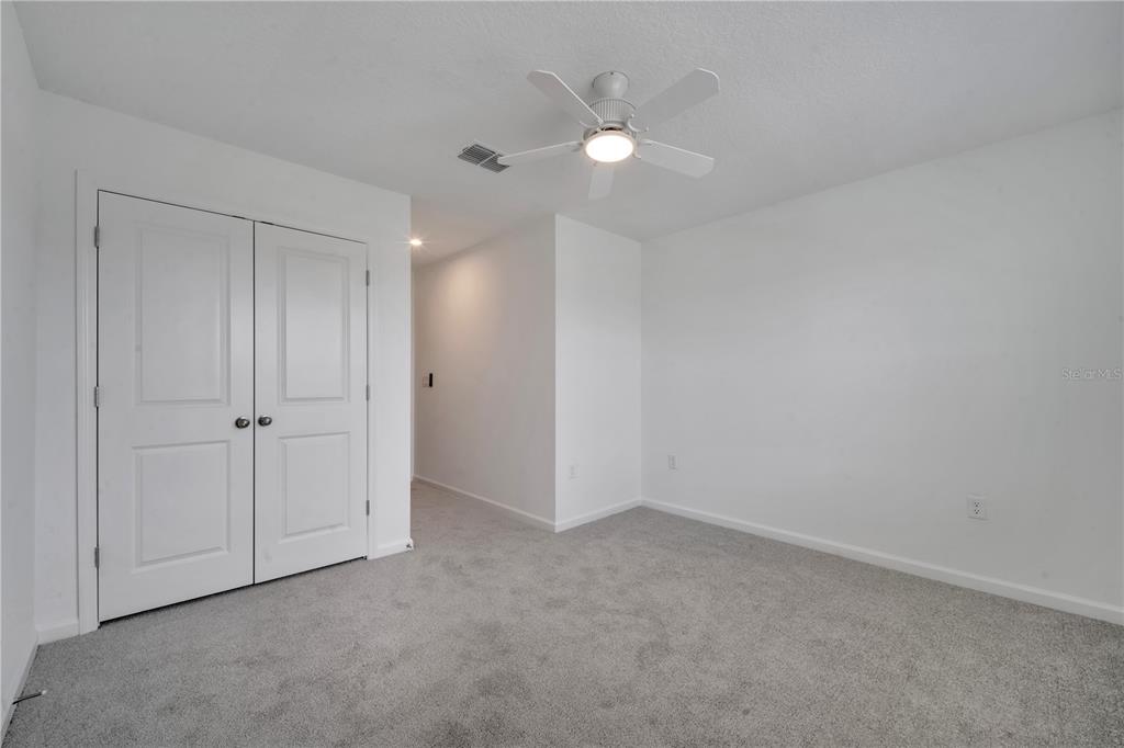 9068 Ocean Tide Way Kissimmee, FL 34747 - Photo 32 of 42 a view of an empty room