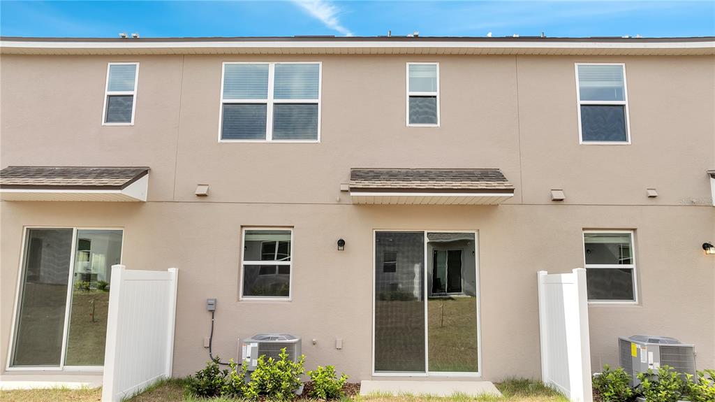 9068 Ocean Tide Way Kissimmee, FL 34747 - Photo 39 of 42 front view of a house