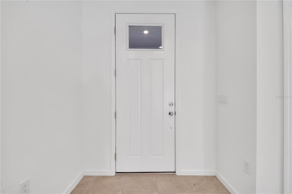 9068 Ocean Tide Way Kissimmee, FL 34747 - Photo 4 of 42 a view of a hallway