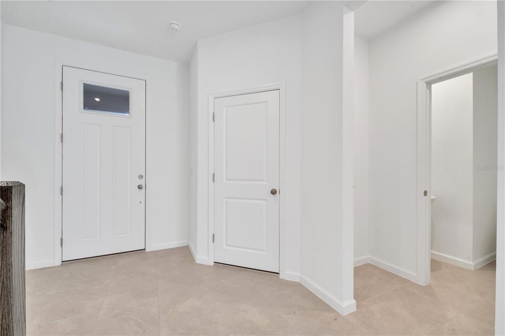 9068 Ocean Tide Way Kissimmee, FL 34747 - Photo 5 of 42 a view of an empty room and closet area