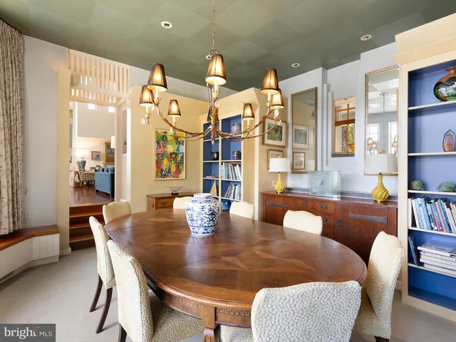 a kitchen with stainless steel appliances granite countertop a sink and a stove
