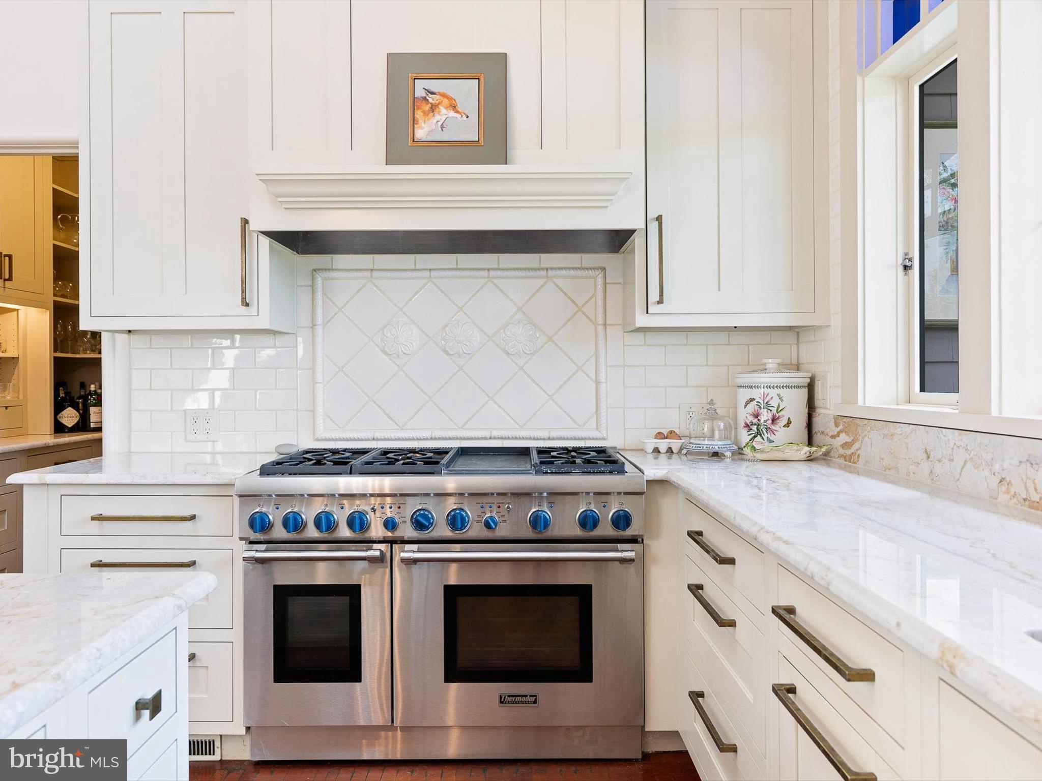 2299 Hilltop View Road Coatesville, PA 19320 - Photo 23 of 96 a stove top oven sitting inside of a kitchen
