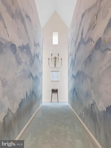 a room with a desk and a window