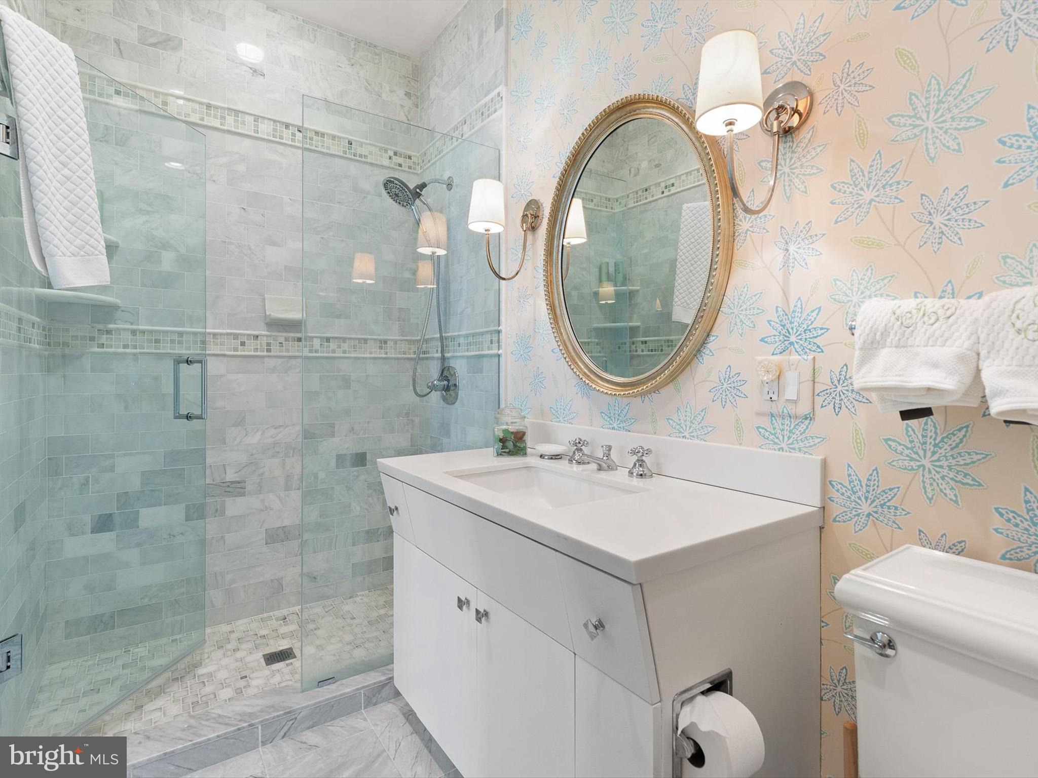 2299 Hilltop View Road Coatesville, PA 19320 - Photo 42 of 96 a bathroom with a sink mirror and a shower