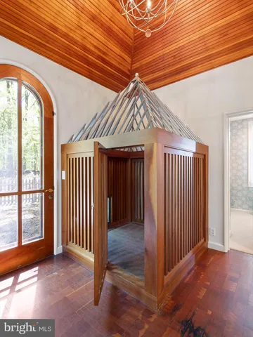 an aerial view of a house with a big yard