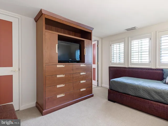 a picture of a room with lots of cabinet