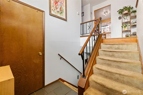 a view of entryway with a front door